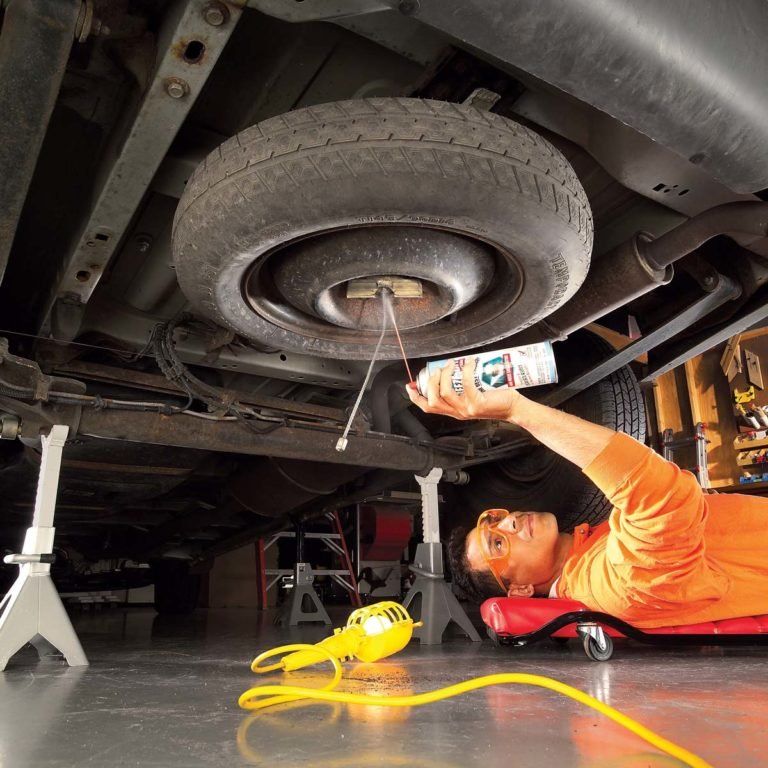 How to take off spare tire under truck