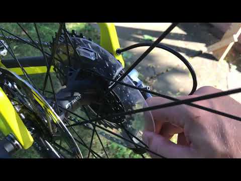 How to remove rear bike tire without quick release